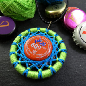 Ugandan Fanta Bottle Cap Zwirnknopfe Pendant